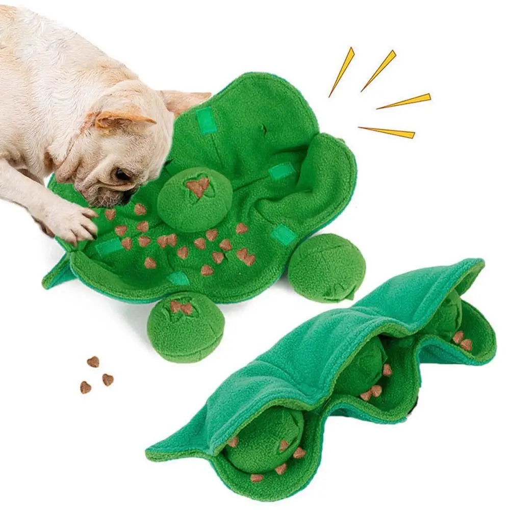 Green frog-shaped pet toy with a dog interacting with it on a white background
