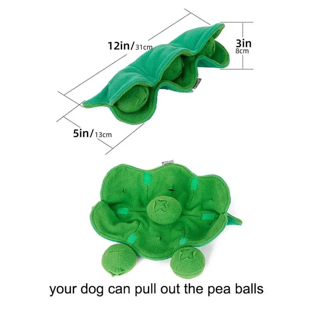 Green plush toy shaped like a pea pod with measurements and text on a white background