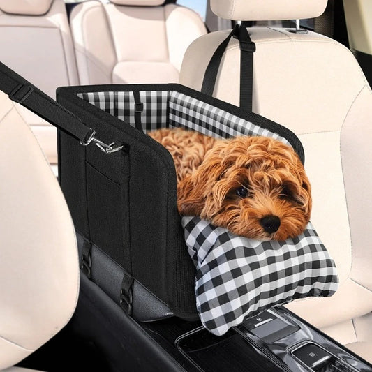 Dog in a car seat cover with checkered pattern in a vehicle
